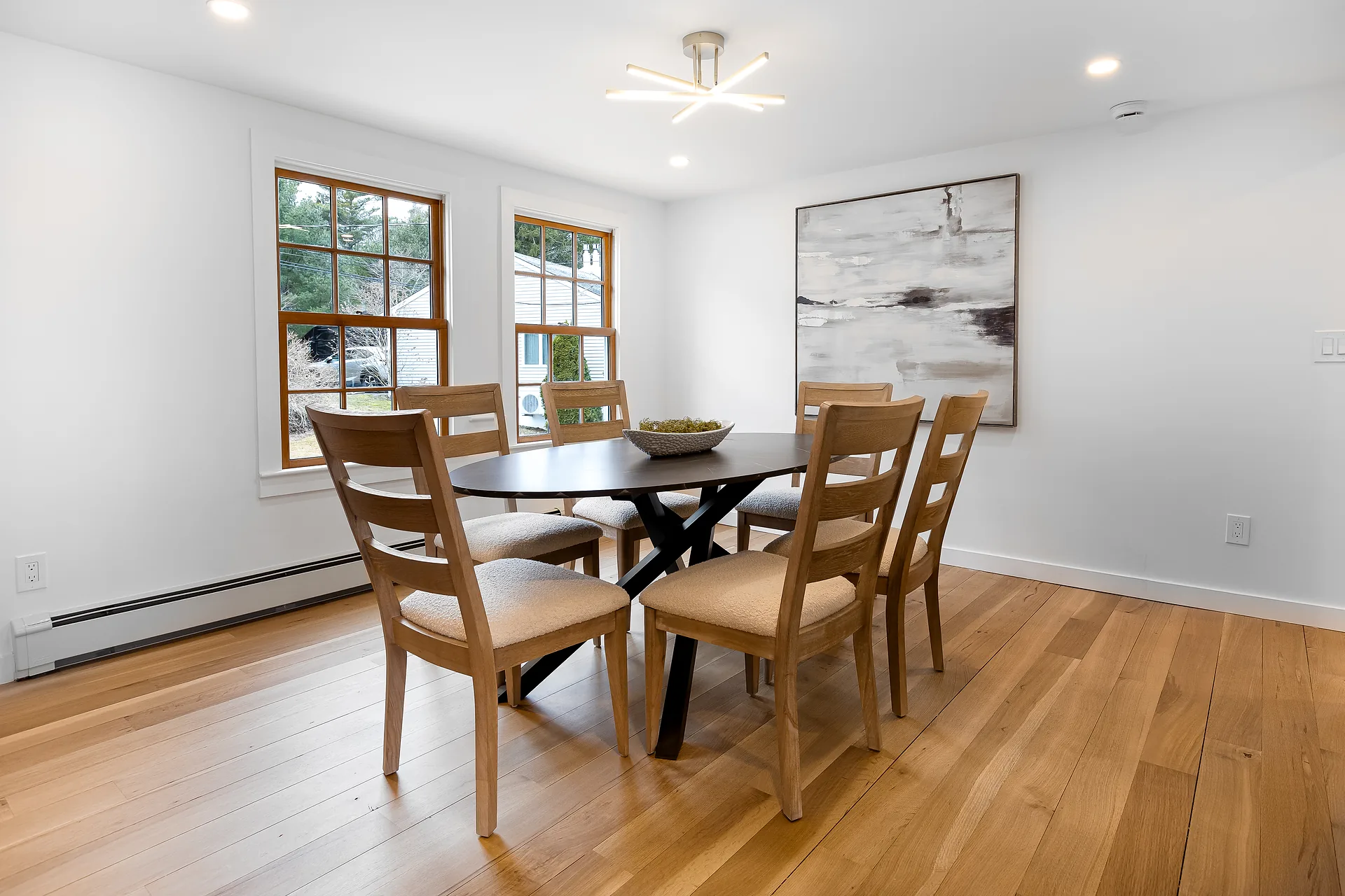 Finished wood flooring and dining room interior detail by Prospera Home Solutions in Utah